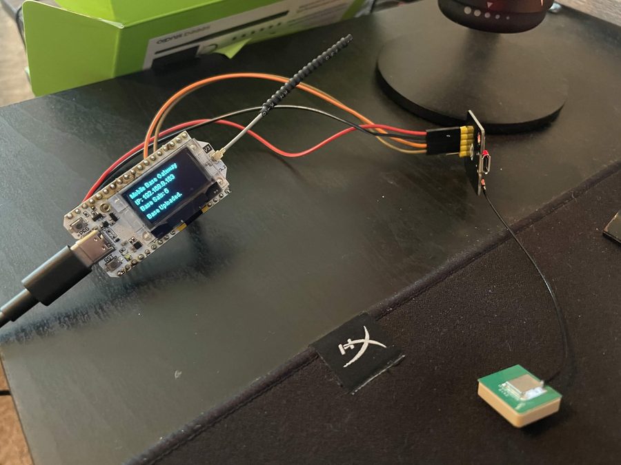 ESP32 base gateway showing status on its OLED display